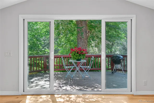 a view of a chairs on the deck