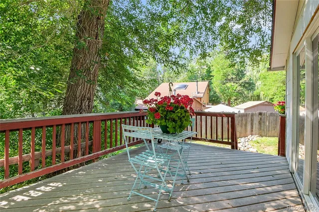 a view of balcony with furniture