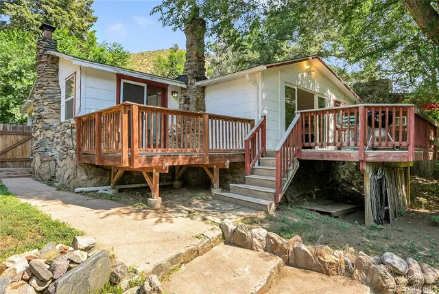 a view of backyard with a patio