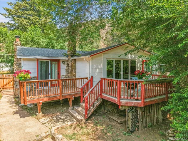 a view of a deck with a deck and a yard