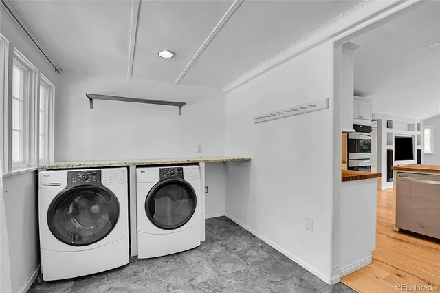a utility room with dryer and washer