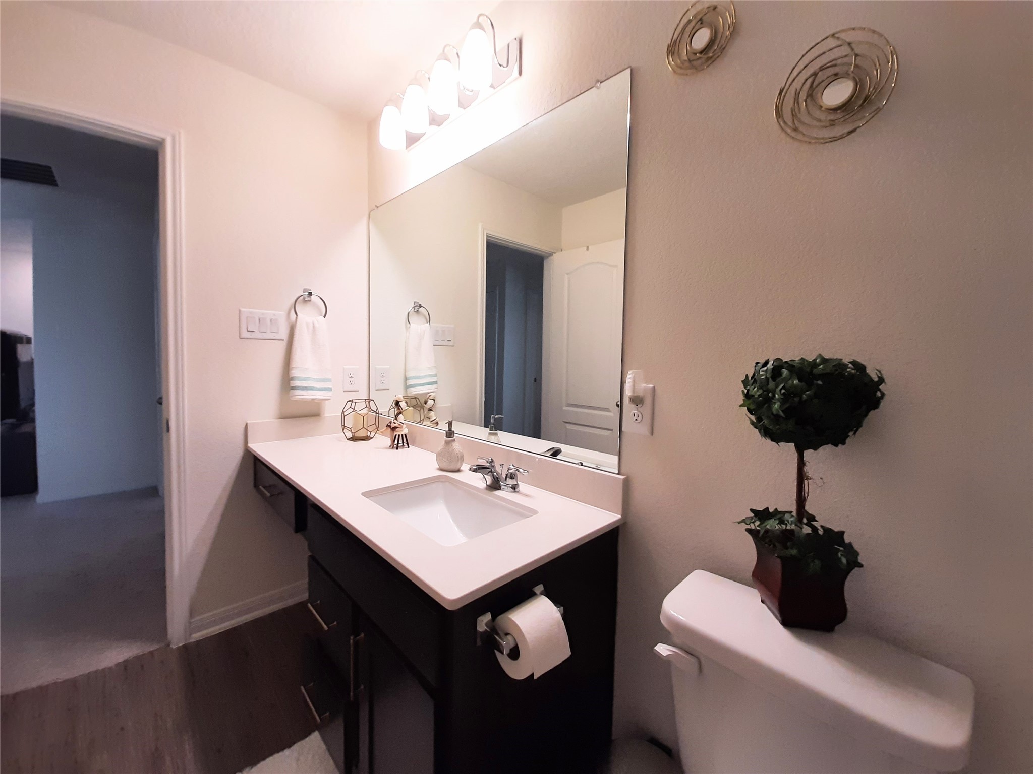3322 Forest Chitto Dr Spring Spring, TX 77373 - Photo 18 of 18 a bathroom with a sink a toilet and a mirror