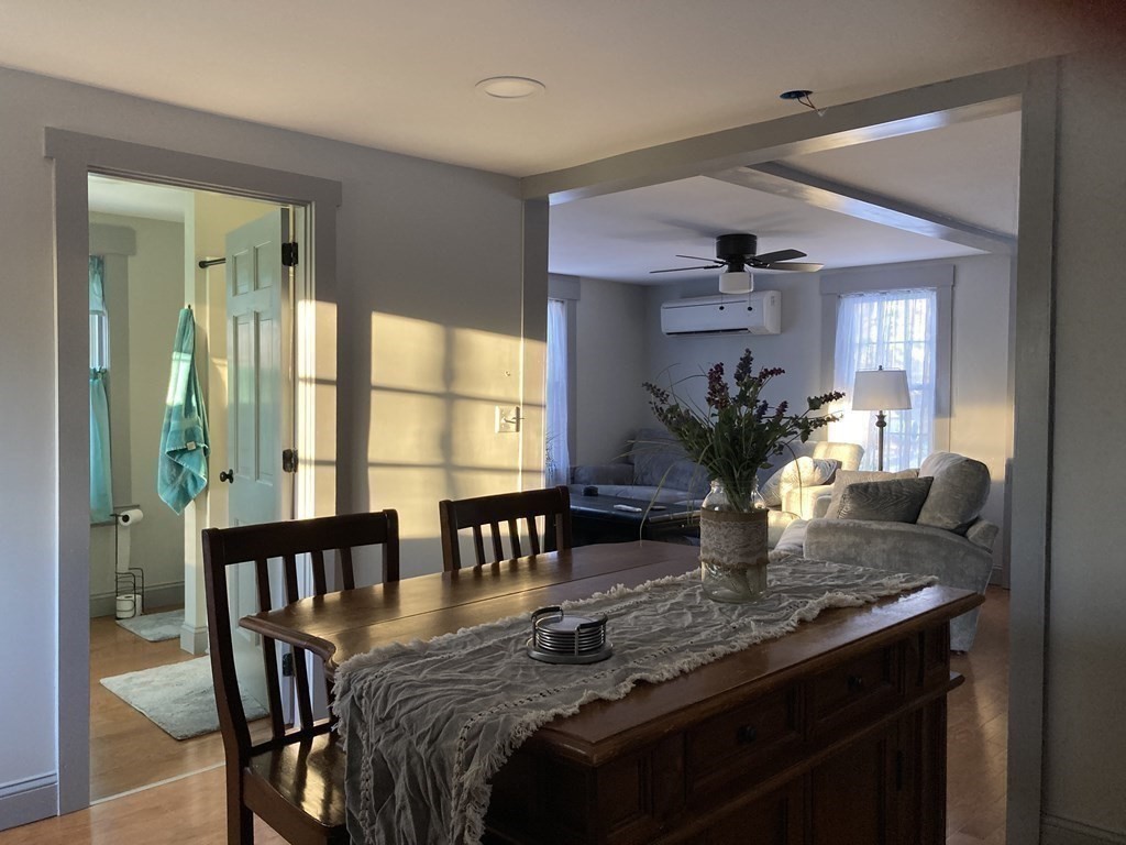 3 Pine Street Gardner, MA 01440 - Photo 14 of 32 a view of a dining room with furniture and a potted plant