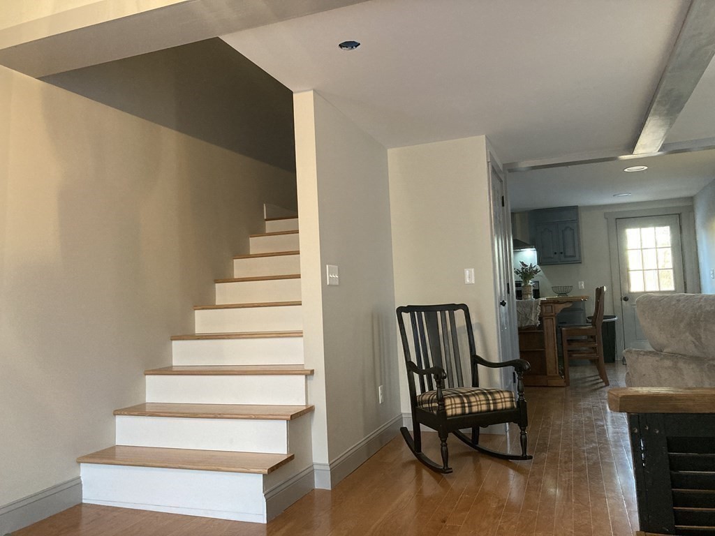 3 Pine Street Gardner, MA 01440 - Photo 19 of 32 a view of entryway and hall with wooden floor