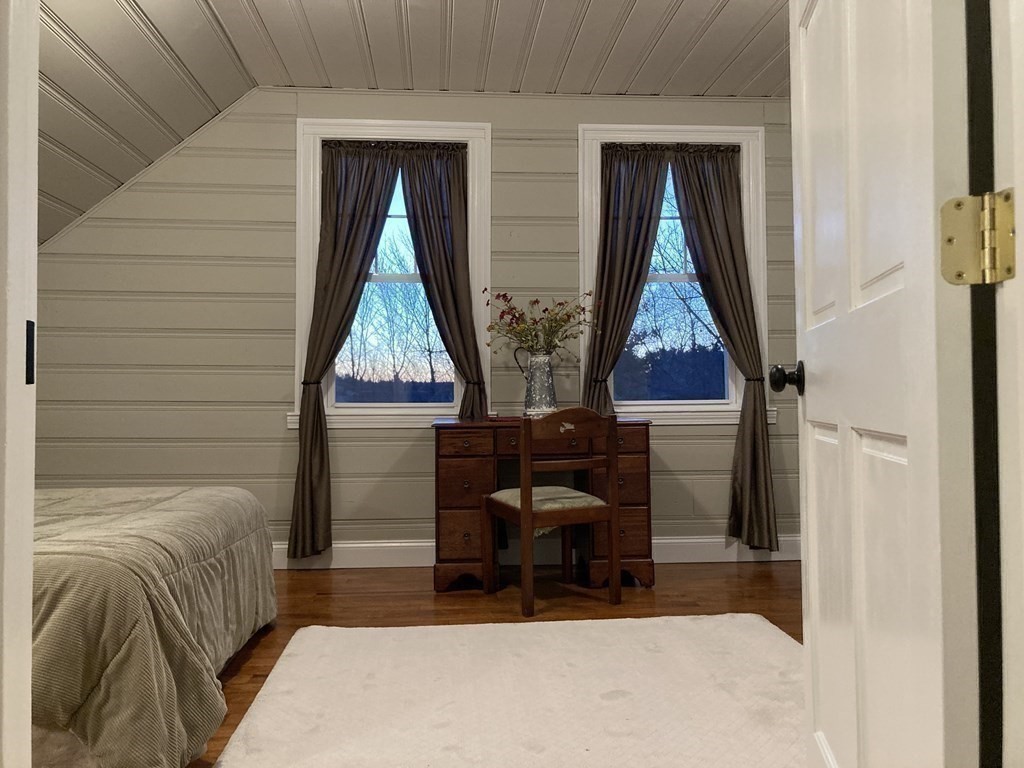 3 Pine Street Gardner, MA 01440 - Photo 20 of 32 a bed room with a bed and a window