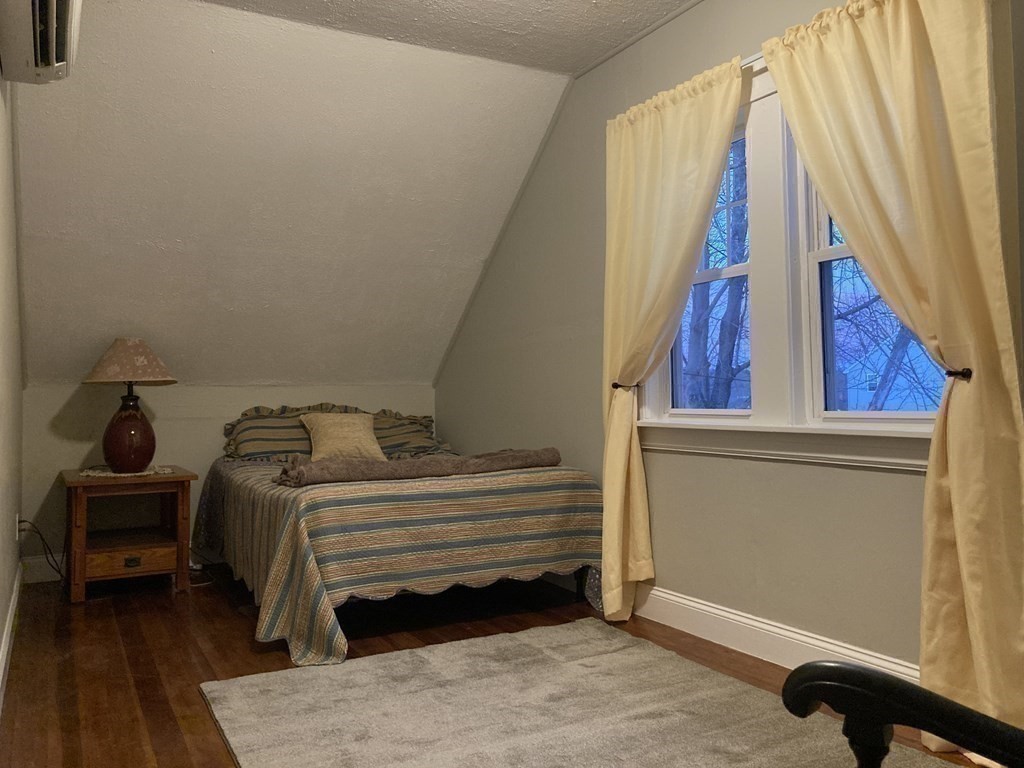 3 Pine Street Gardner, MA 01440 - Photo 24 of 32 a bedroom with a bed and a window