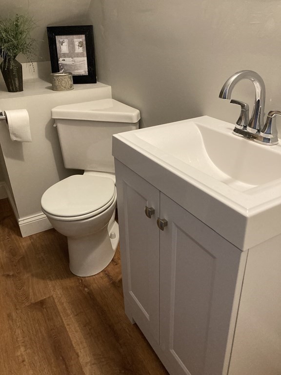 3 Pine Street Gardner, MA 01440 - Photo 27 of 32 a bathroom with a toilet sink and mirror