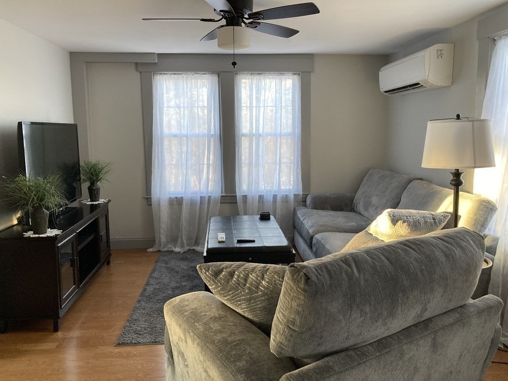 3 Pine Street Gardner, MA 01440 - Photo 7 of 32 a living room with furniture and a flat screen tv