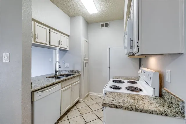 $92,900 | 9747 Whitehurst Drive, Unit 150, Dallas, TX 75243