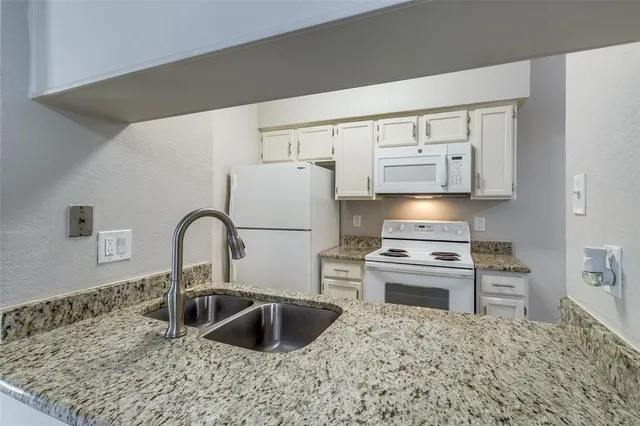 $92,900 | 9747 Whitehurst Drive, Unit 150, Dallas, TX 75243