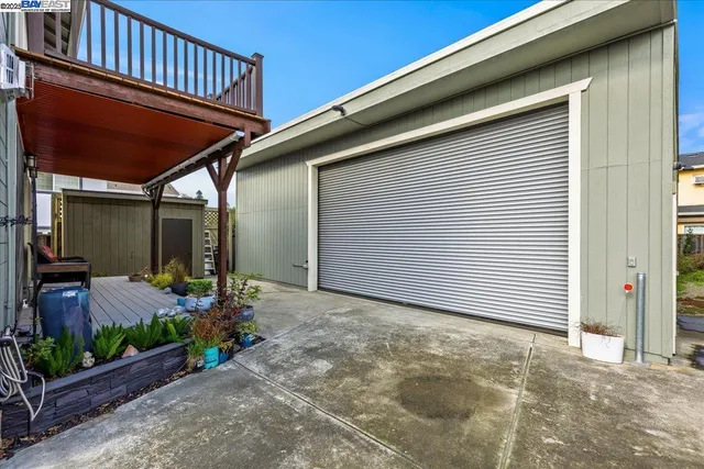 a backyard of a house with seating space