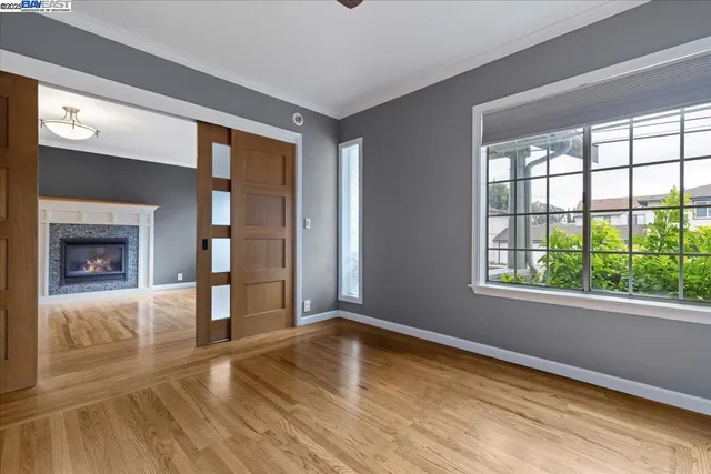 a kitchen with stainless steel appliances kitchen island granite countertop a stove a sink and a refrigerator