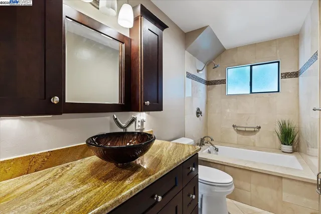 a backyard of a house with sitting area