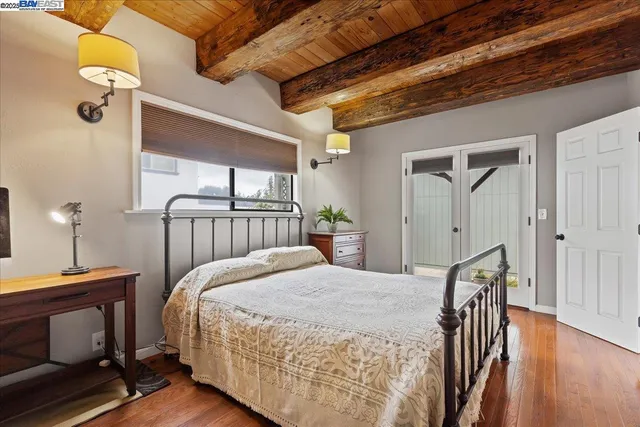 a front view of a house with yard and porch