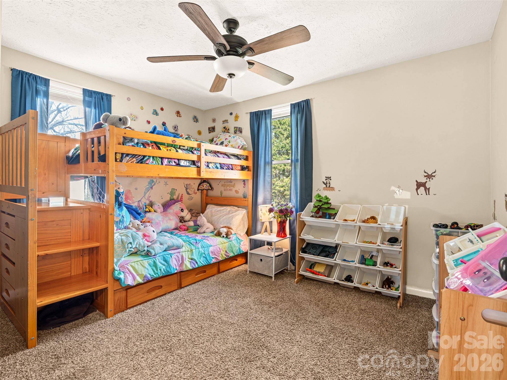 6 Nelson Road Hendersonville, NC 28791 - Photo 11 of 18 a view of room with toys and ceiling fan