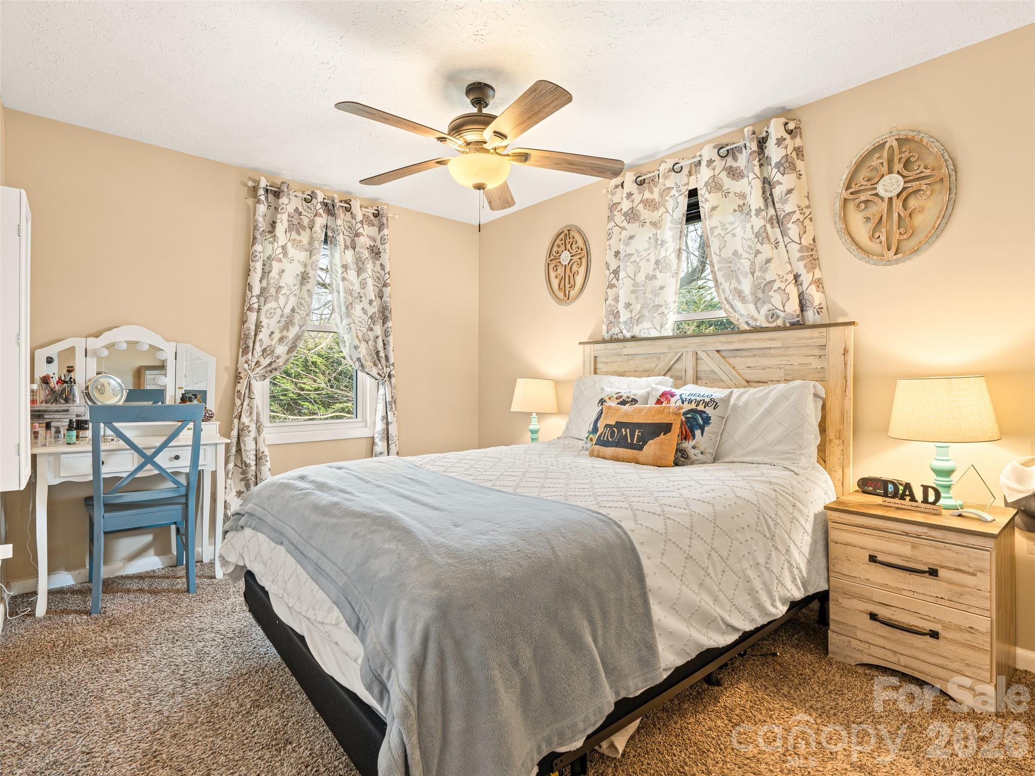 6 Nelson Road Hendersonville, NC 28791 - Photo 13 of 18 a bedroom with a bed and painting on the wall
