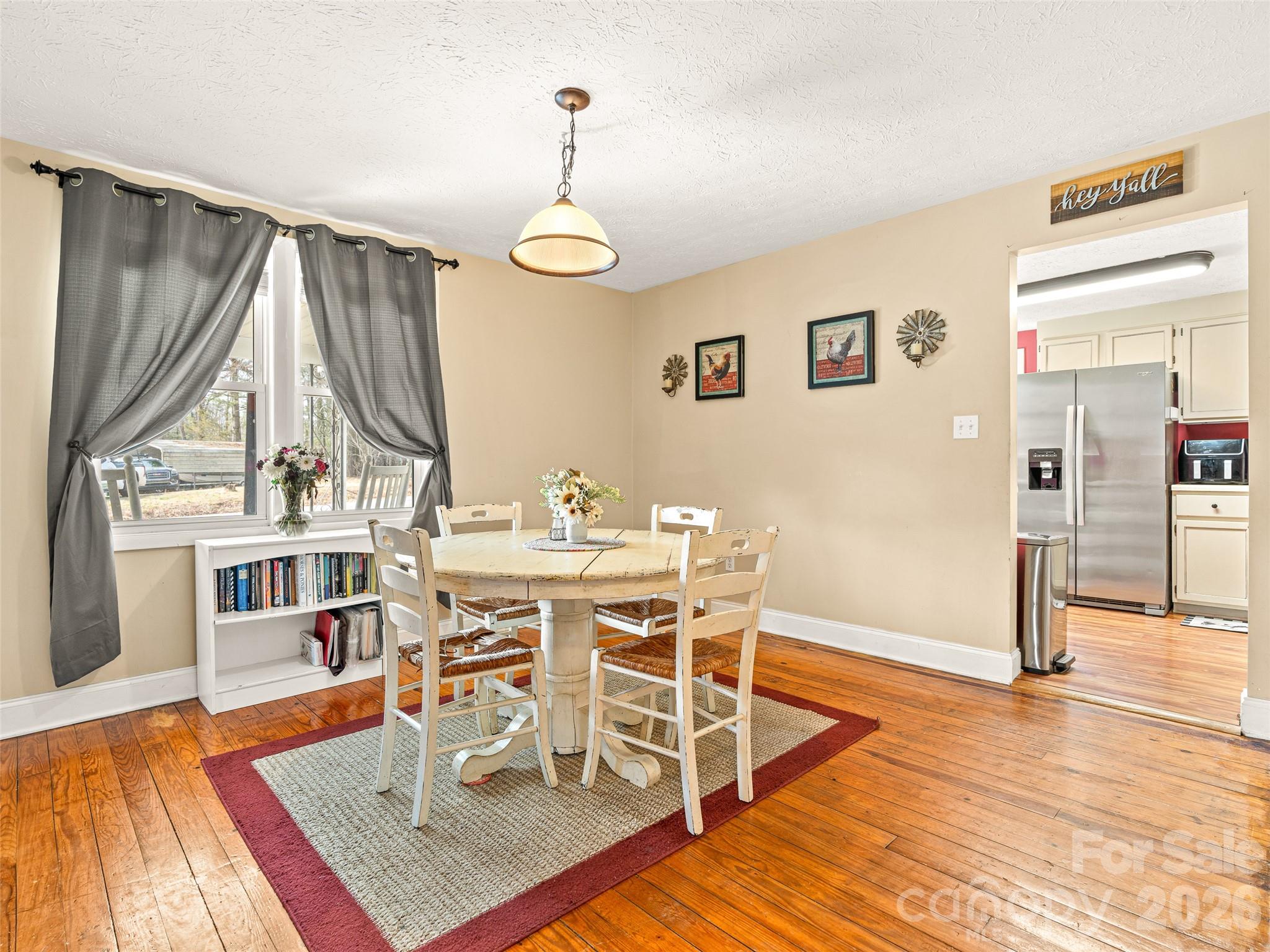 6 Nelson Road Hendersonville, NC 28791 - Photo 6 of 18 a living room with furniture a rug and a table