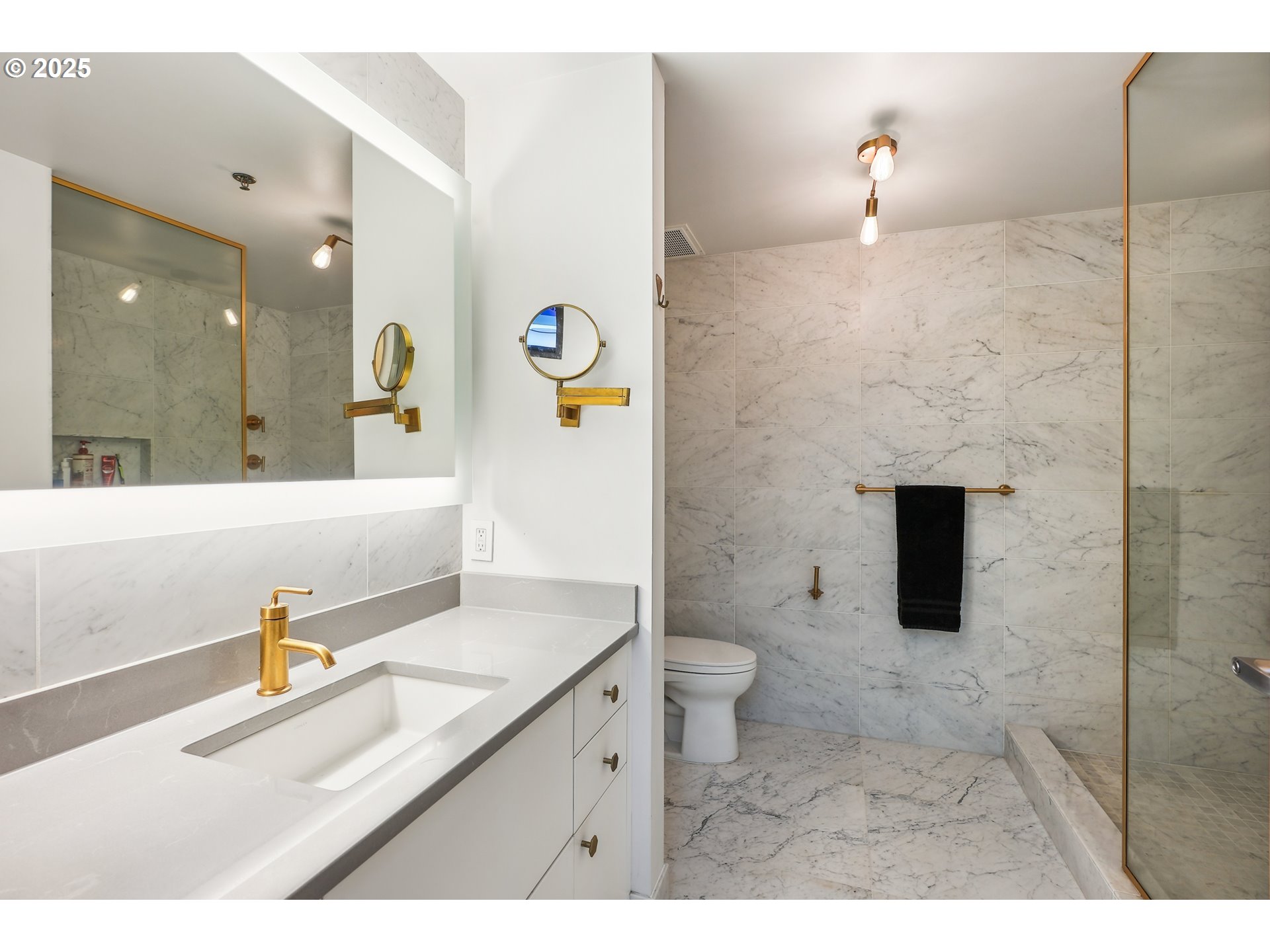 1221 Southwest 10th Avenue, Unit 410 Portland, OR 97205 - Photo 18 of 26 a bathroom with a sink toilet and shower