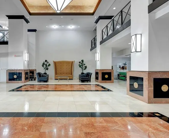 a view of living room with furniture and fireplace