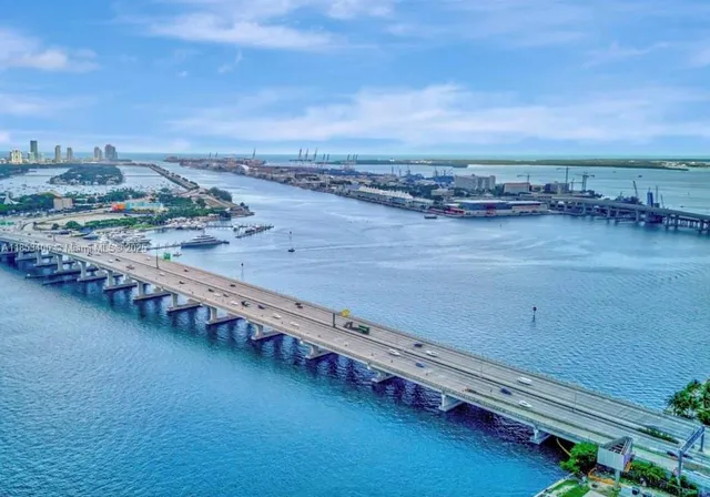 a view of a city with tall buildings