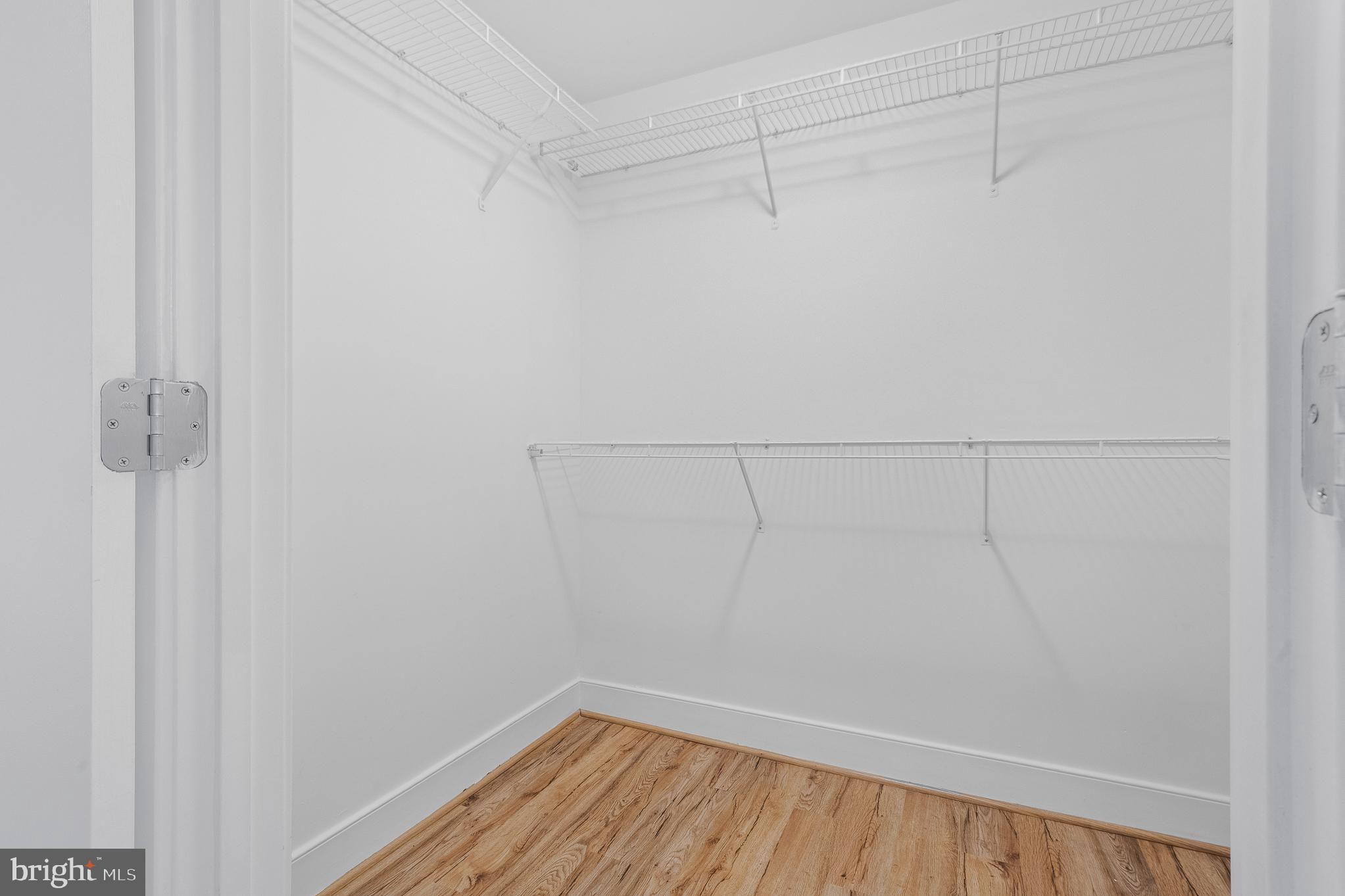 910 M Street Northwest, Unit 126 Washington, DC 20001 - Photo 26 of 54 a view of a room with racks on the wall