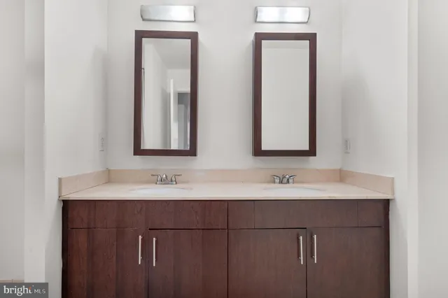a bathroom with a tub and shower