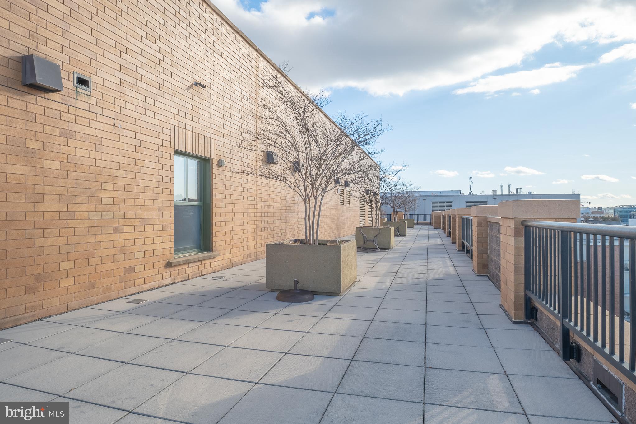 910 M Street Northwest, Unit 126 Washington, DC 20001 - Photo 45 of 54 a view of a terrace with sky view