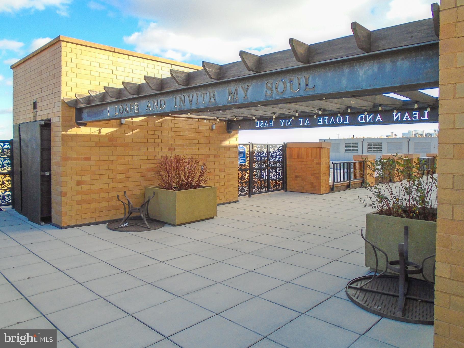 910 M Street Northwest, Unit 126 Washington, DC 20001 - Photo 48 of 54 a view of a street with an outdoor seating