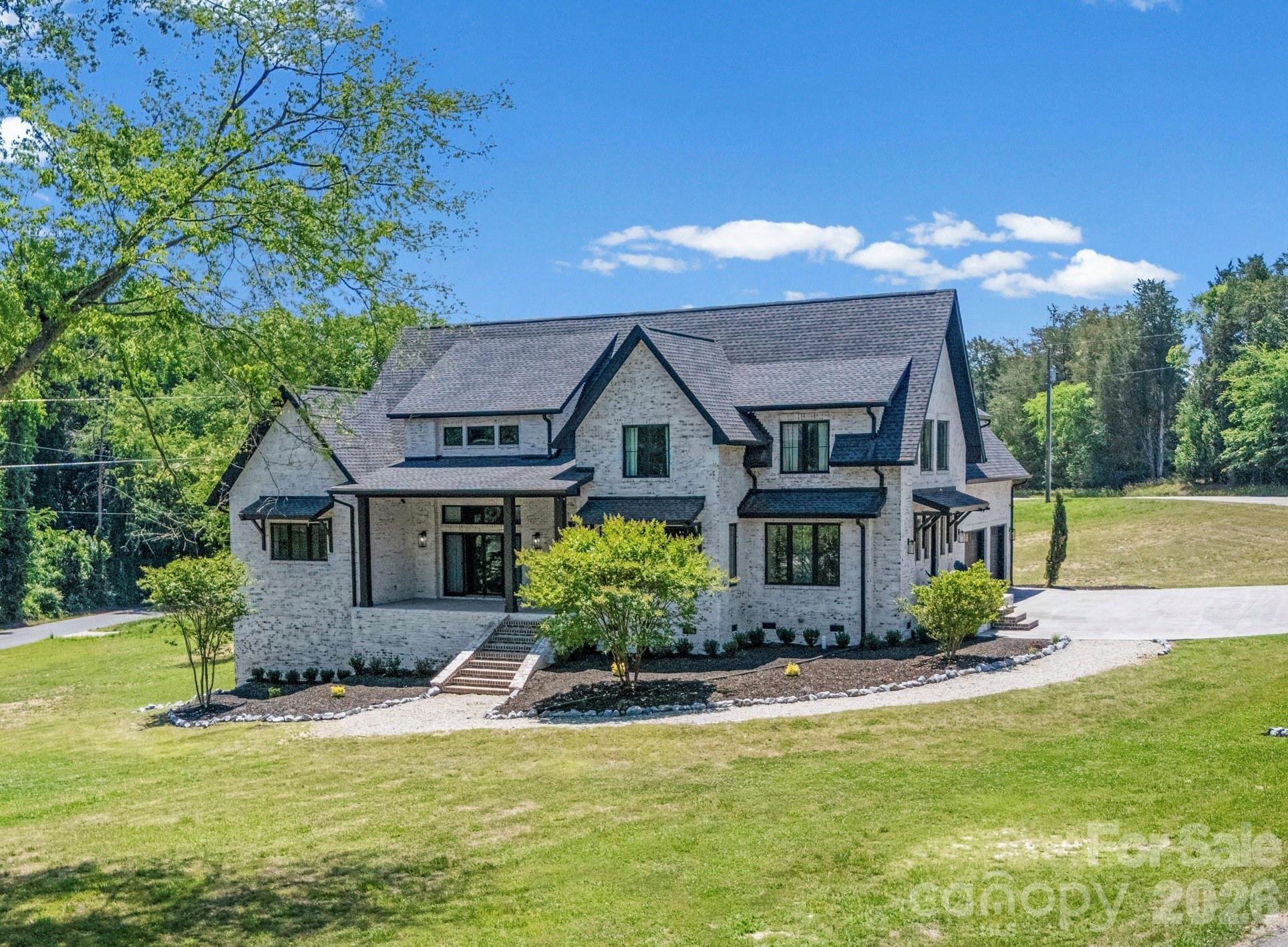 5438 Ralph Harper Lane Clover, SC 29710 - Photo 2 of 28 a front view of a house with a yard