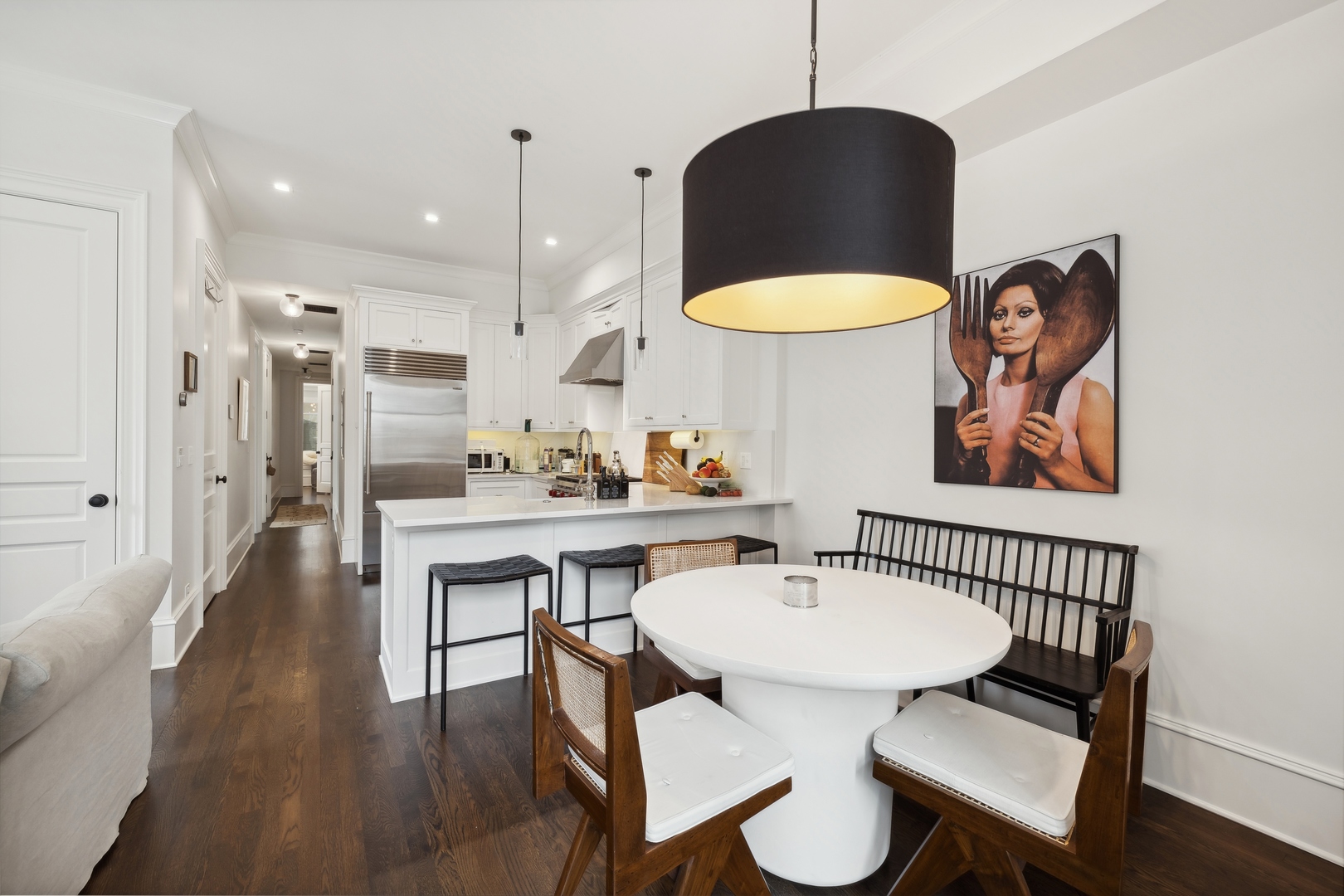 1300 North Ritchie Court, Unit 2 Chicago, IL 60610 - Photo 18 of 25 a view of a dining room with furniture and wooden floor