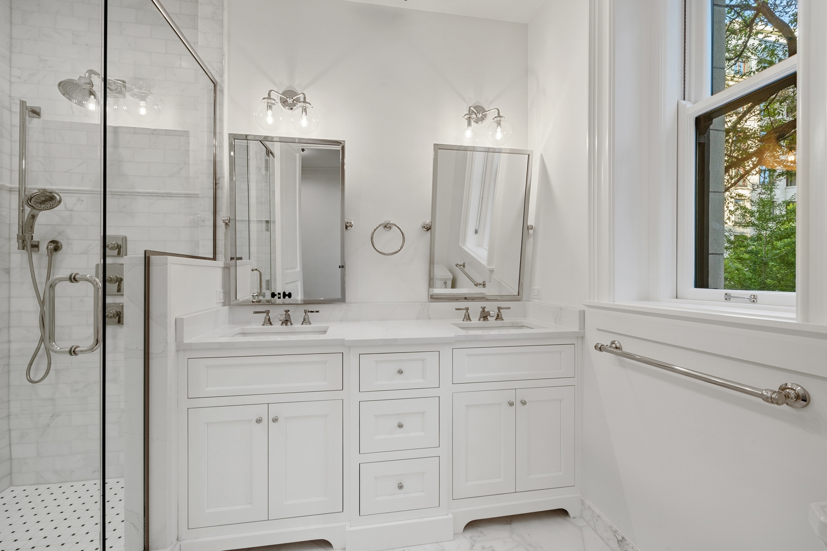 1300 North Ritchie Court, Unit 2 Chicago, IL 60610 - Photo 20 of 25 a bathroom with double vanity sink a mirror a window and vanity
