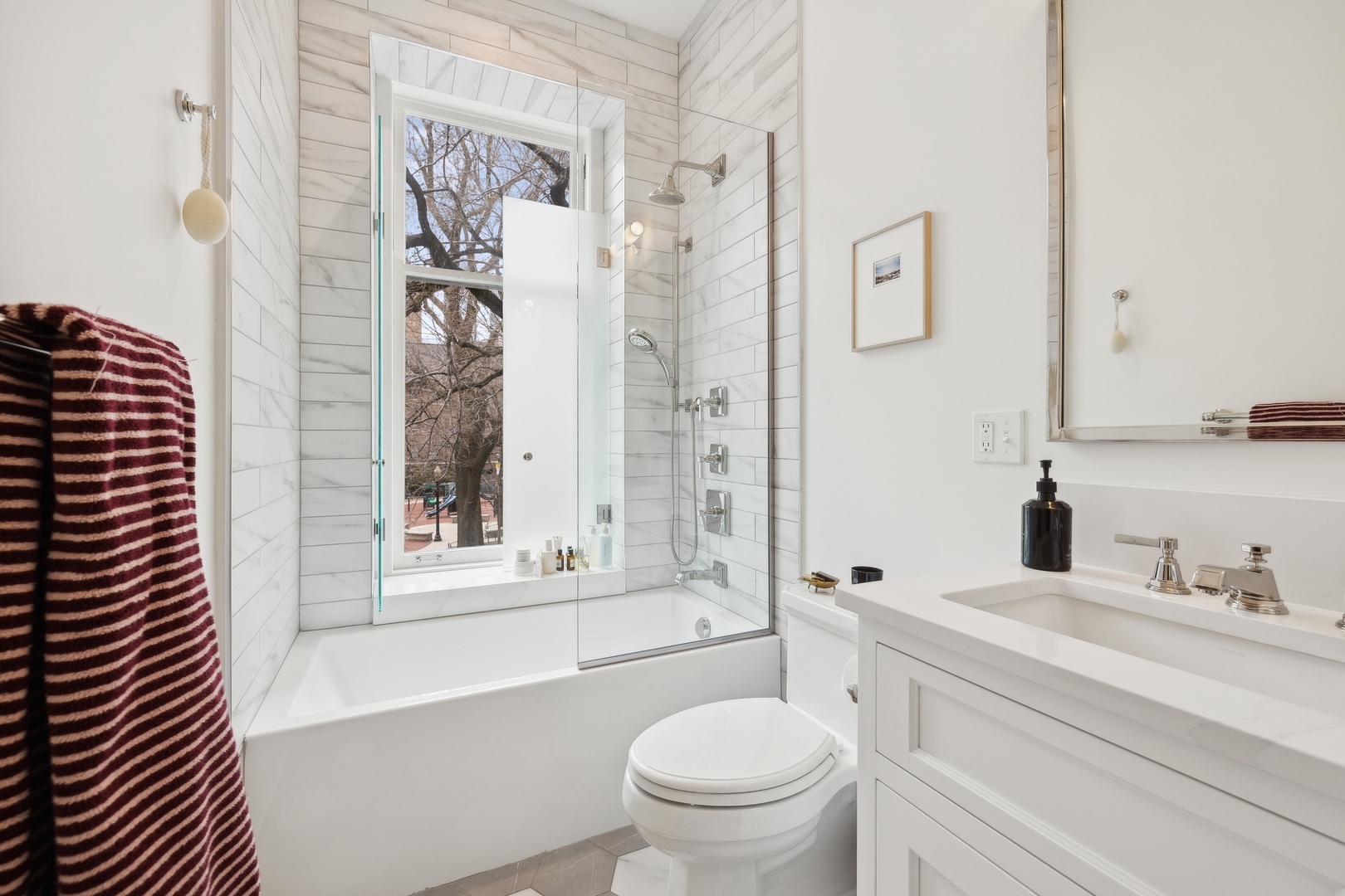 1300 North Ritchie Court, Unit 2 Chicago, IL 60610 - Photo 24 of 25 a bathroom with a sink toilet and shower
