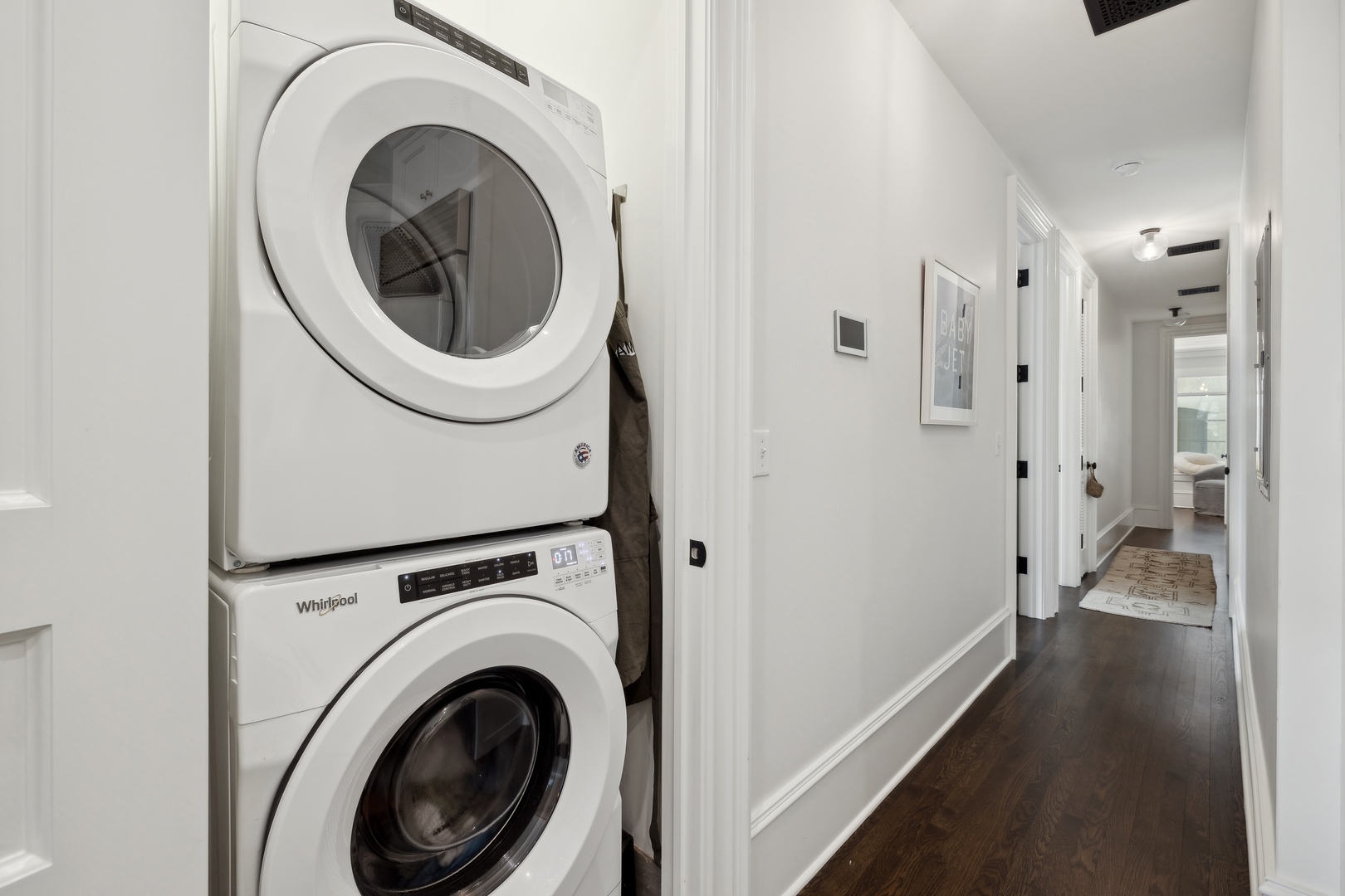1300 North Ritchie Court, Unit 2 Chicago, IL 60610 - Photo 25 of 25 a view of a hallway with washer and dryer