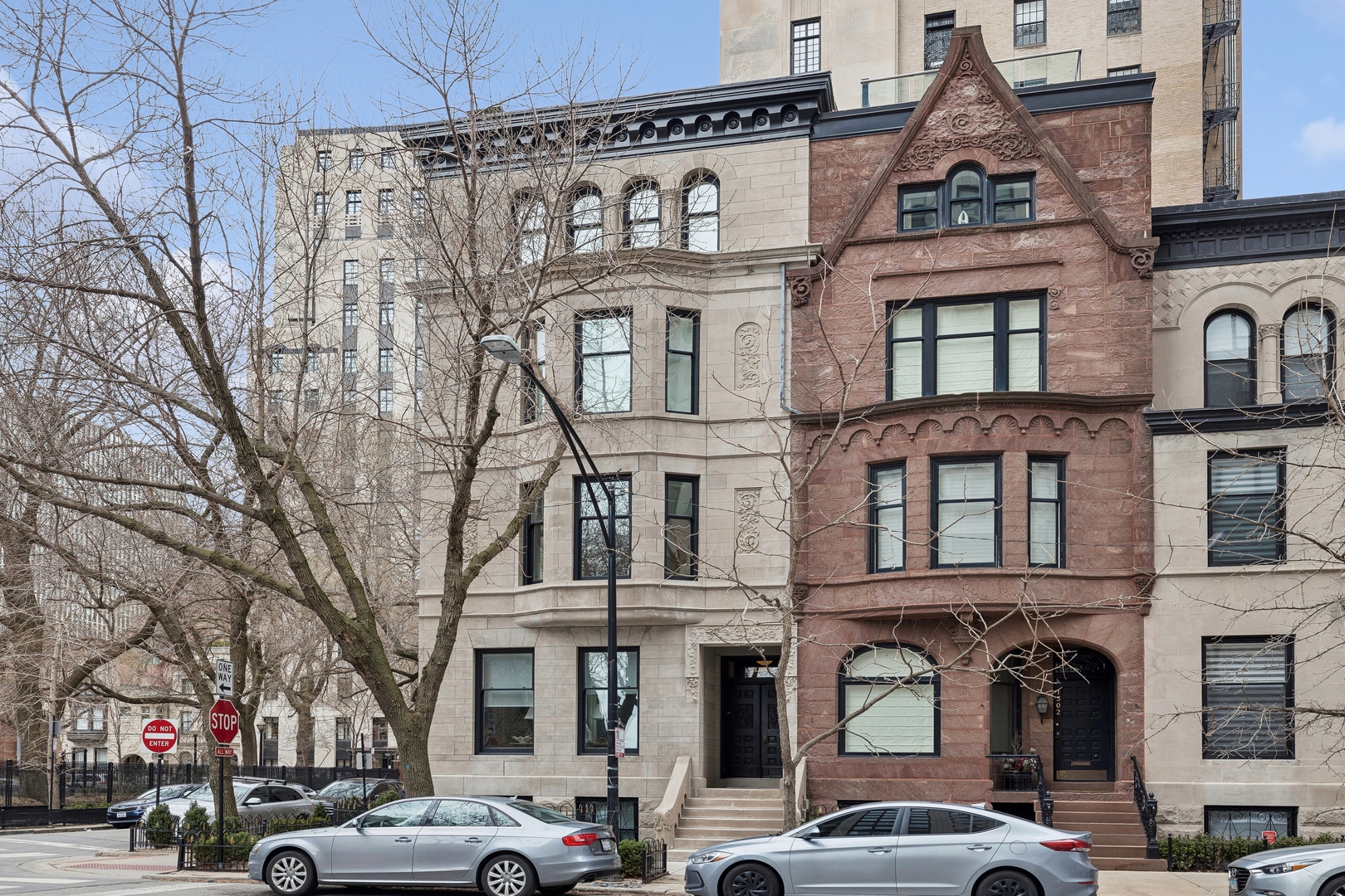 1300 North Ritchie Court, Unit 2 Chicago, IL 60610 - Photo 5 of 25 a front view of a building and car parked