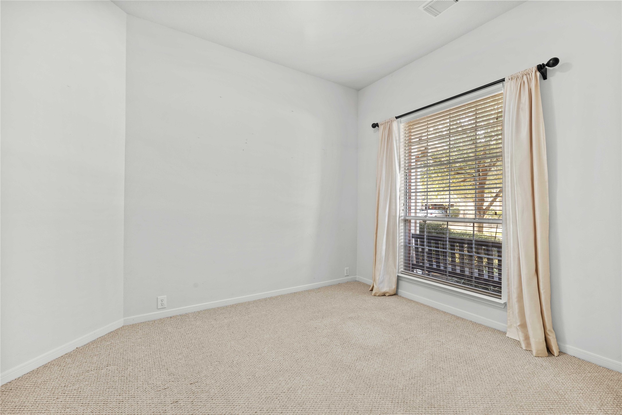 2915 Sandleigh Drive Spring, TX 77388 - Photo 17 of 30 a view of an empty room with a window