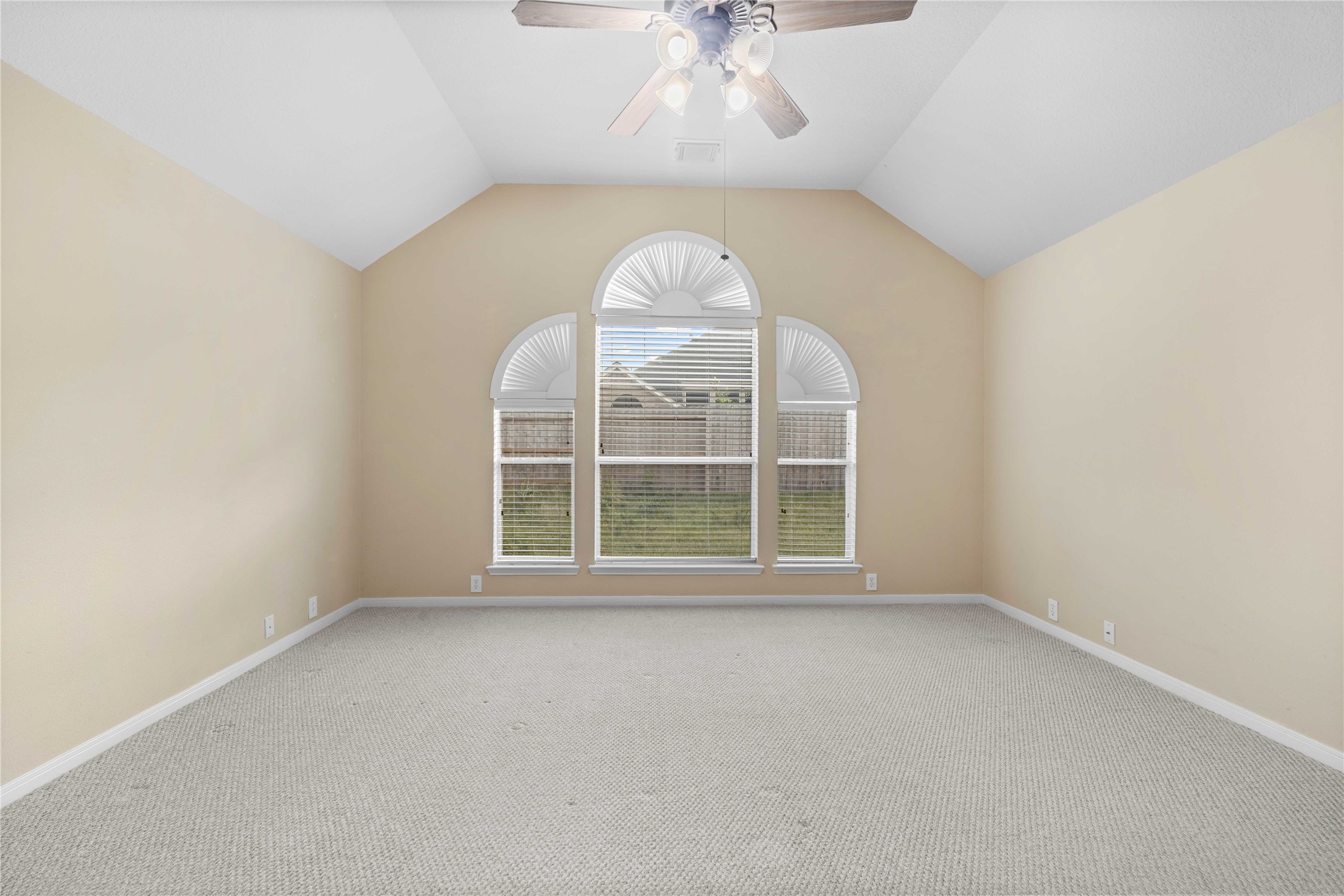 2915 Sandleigh Drive Spring, TX 77388 - Photo 18 of 30 an empty room with a large window and a chandelier