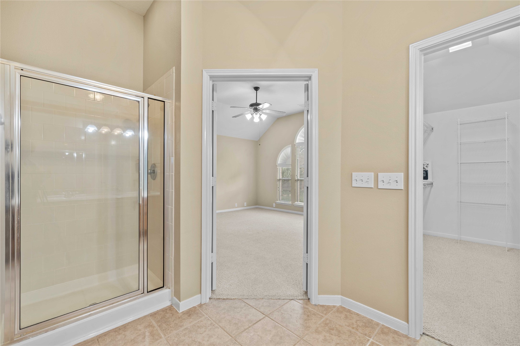 2915 Sandleigh Drive Spring, TX 77388 - Photo 21 of 30 a bathroom with a glass shower door and a mirror