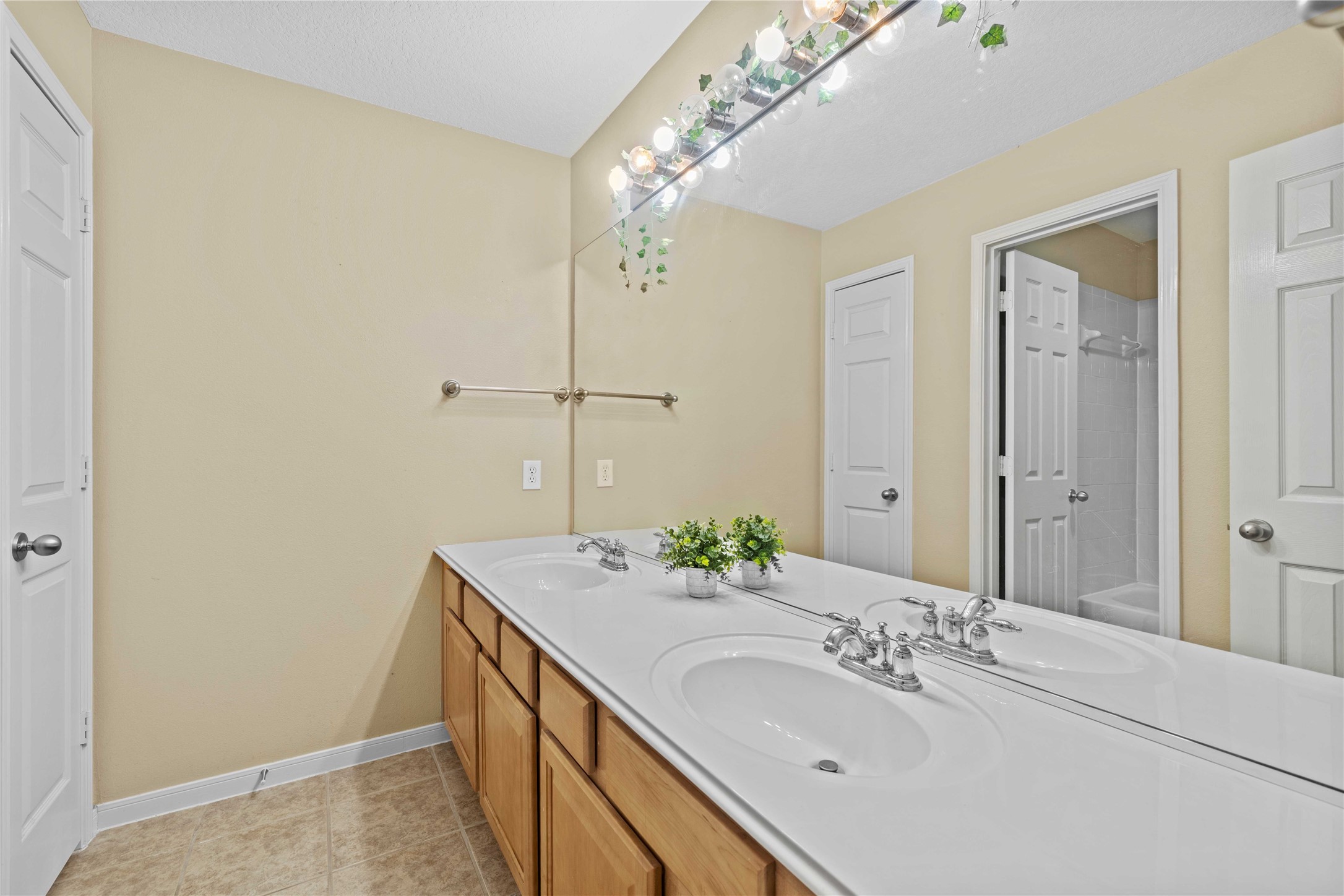 2915 Sandleigh Drive Spring, TX 77388 - Photo 26 of 30 a bathroom with a sink and a mirror