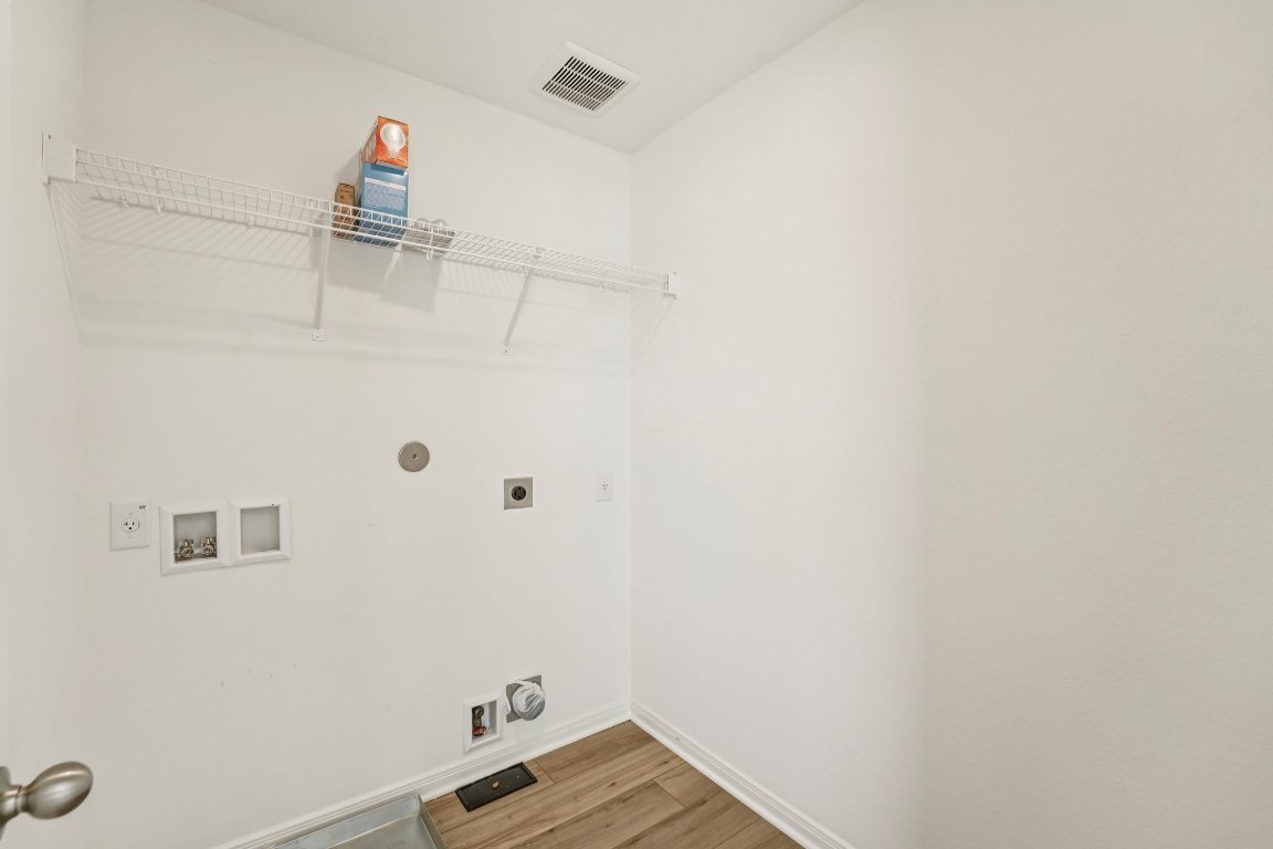 571 Aplite Pass Maxwell, TX 78656 - Photo 25 of 29 a bathroom with a sink and vanity