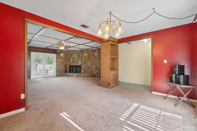 a view of a livingroom with a staircase