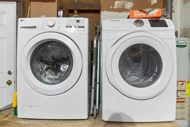 a utility room with dryer and washer