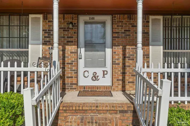 a view of a balcony with door