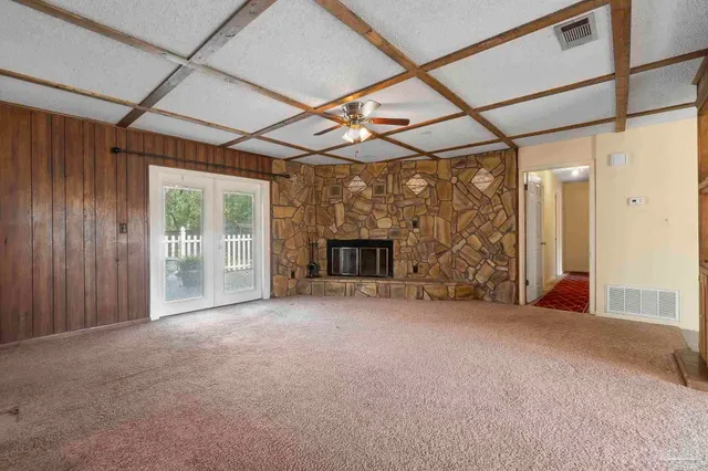 a view of empty room with windows