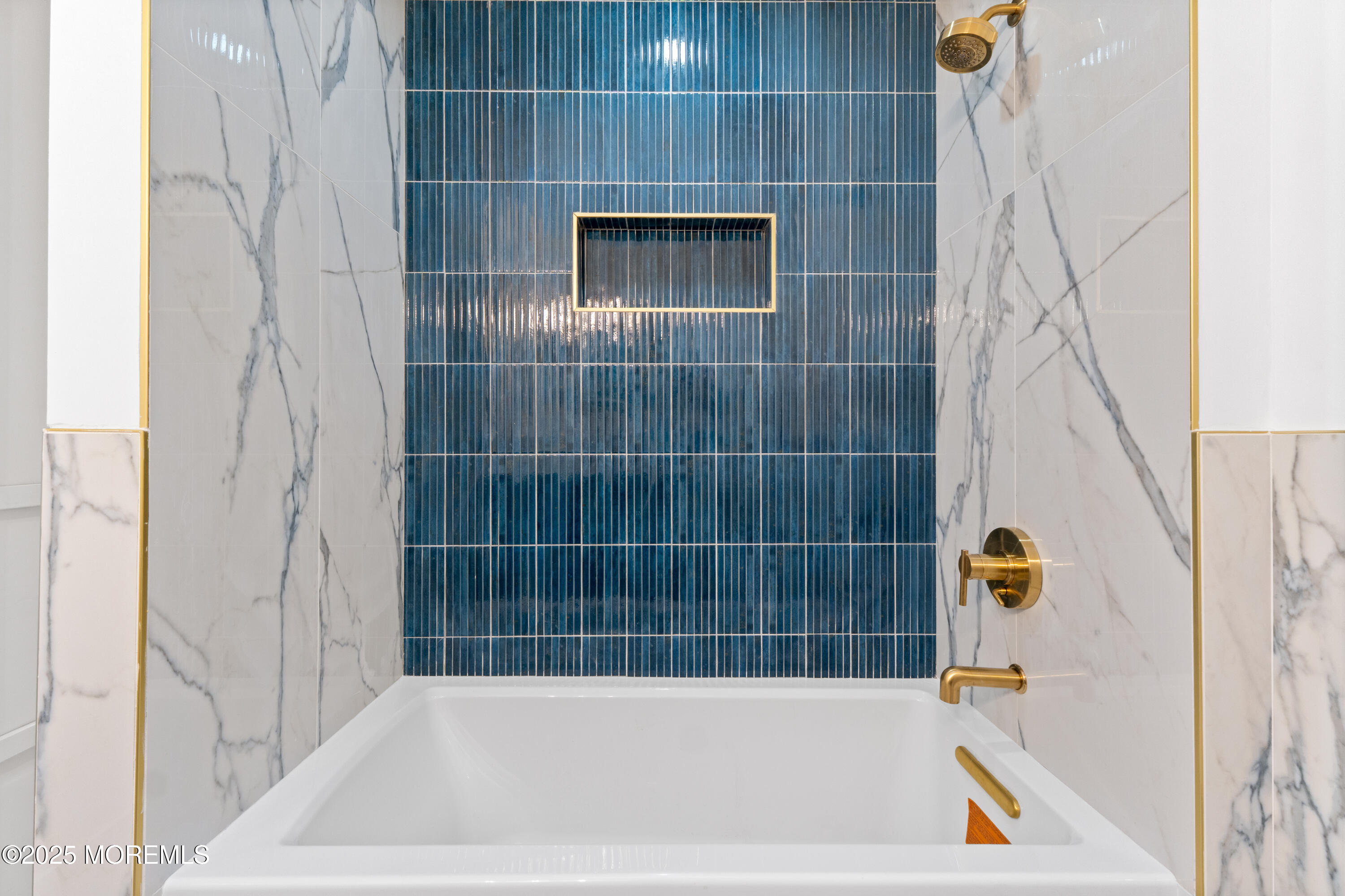 75 Ohio Avenue Middletown, NJ 07758 - Photo 21 of 40 a bathroom with a bath tub