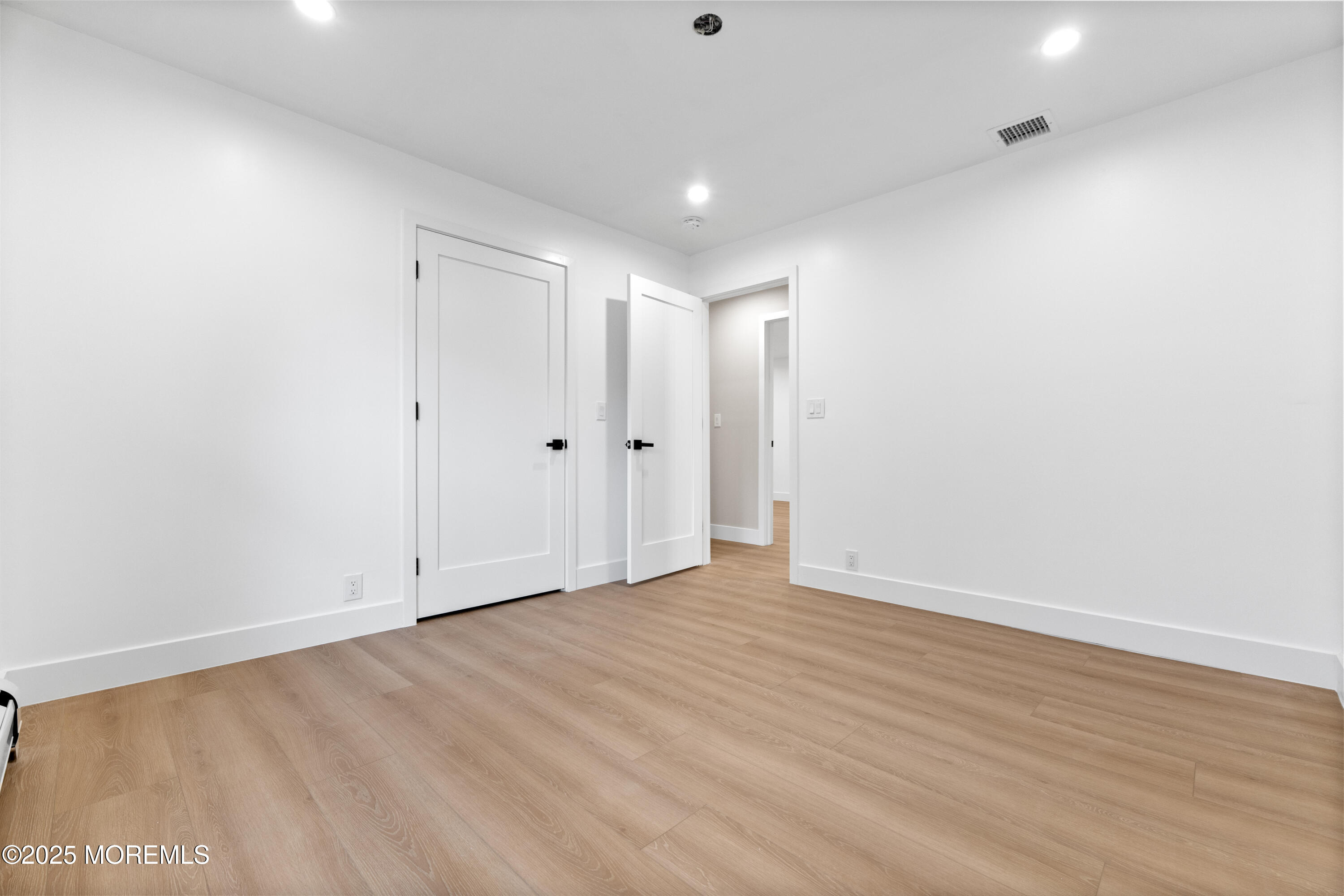 75 Ohio Avenue Middletown, NJ 07758 - Photo 26 of 40 a view of an empty room