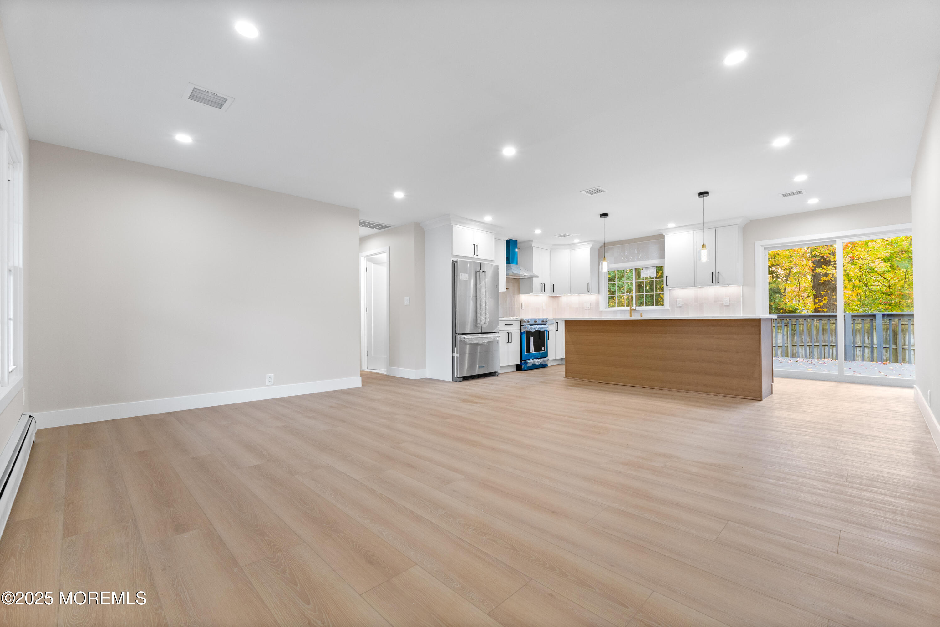 75 Ohio Avenue Middletown, NJ 07758 - Photo 9 of 40 a view of a kitchen with a sink and a window