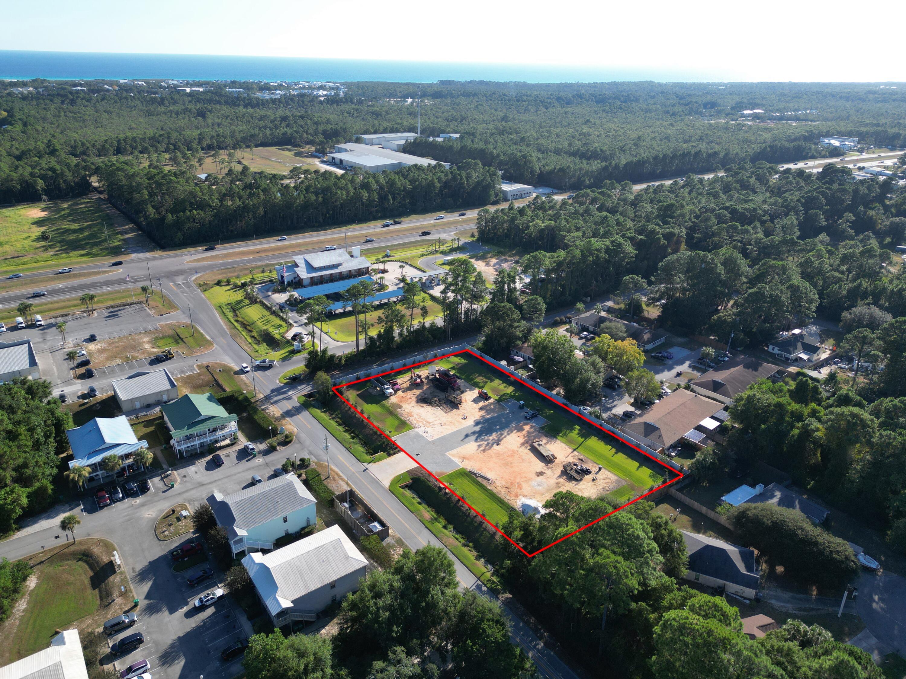 95 Don Bishop Road Santa Rosa Beach, FL 32459 - Photo 13 of 14 an aerial view of residential houses with outdoor space and river
