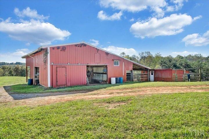 1775 Dickerson Road Goodview, VA 24095 - Photo 17 of 24 a view of a yard in front of a house