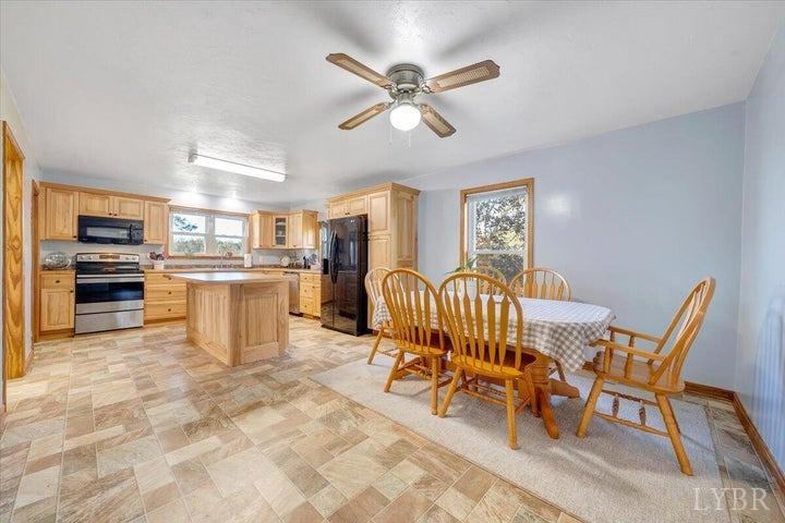 1775 Dickerson Road Goodview, VA 24095 - Photo 4 of 24 a view of a dining room with furniture