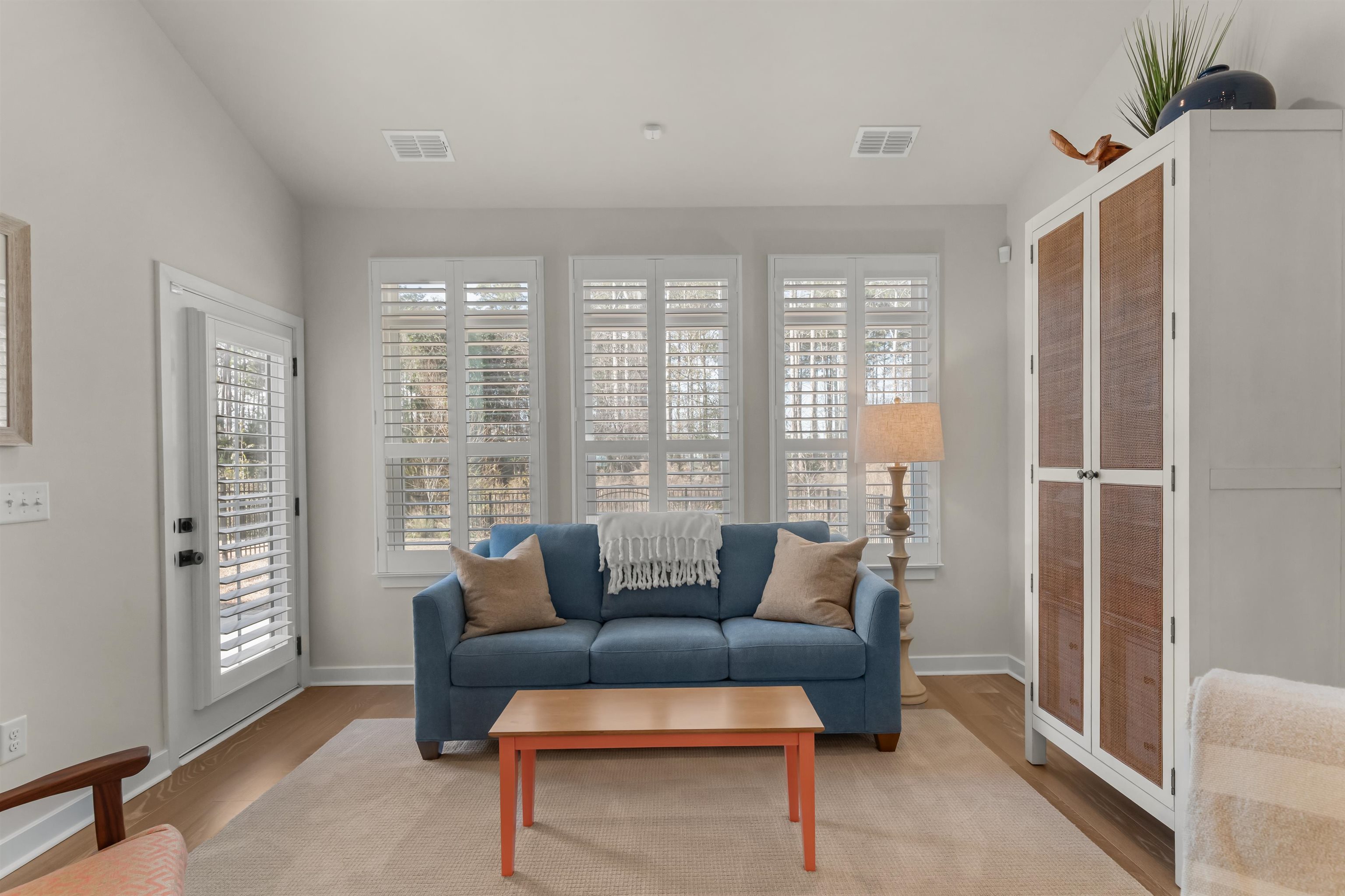 2519 Elowen Lane, Unit 9B Longs, SC 29568 - Photo 9 of 40 Living area featuring wood finished floors and baseboards